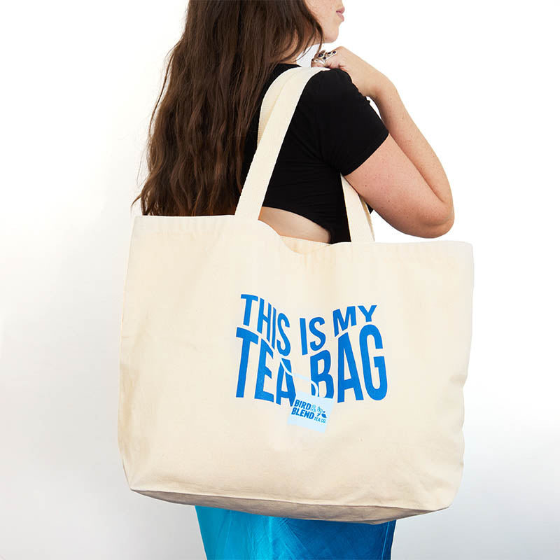 canvas tea tote bag on shoulder